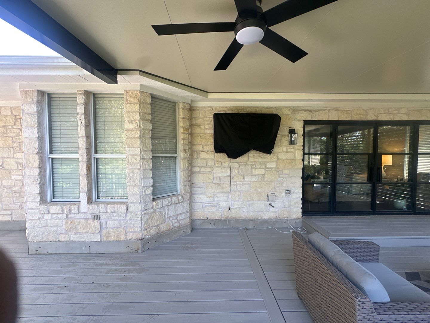 Patio cover interior view with ceiling fan - Austin TX