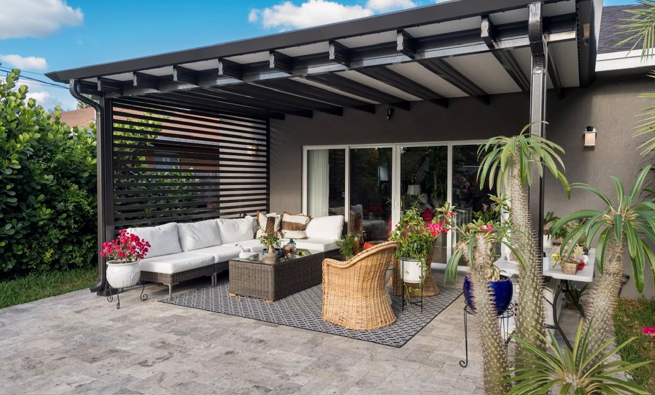 Louvered pergola brick home Austin TX